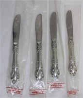 Lot of 4 sterling silver knives