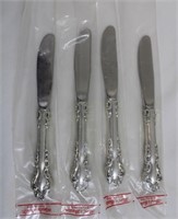 Lot of 4 sterling silver knives