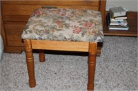 Small wooden stool with hinged decorative cushion