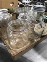Assorted clear glass bottles and jars