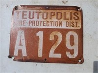 Teutopolis Fire Protection Dist metal sign.