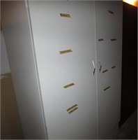 White metal cabinet with shelves