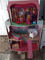 Large Doll House with Assortment of Dolls & Some