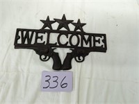 Welcome Pistols Sign