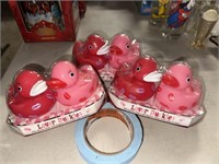 6 pink rubber ducky’s