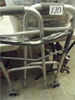 Handicap folding walker