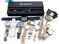 14 montres diverses dont FOSSIL, CARTIER, SEIKO *