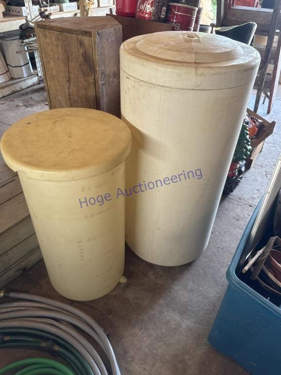 2 PLASTIC BARRELS W/ LIDS 28-36"T, IN GARAGE