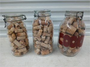 3 glass jars full of assorted corks