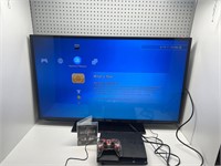 PS3 with controller, game  and cords