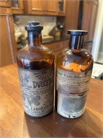 2 Antique Amber Medicine Bottles