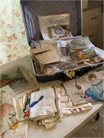 Suitcase full of vintage needlepoint projects