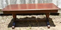 Mahogany coffee table with hidden leaf extension,