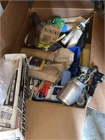 large box of painting supplies with sprayer