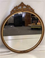 Antique round framed mirror