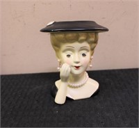 Lady head vase in black hat