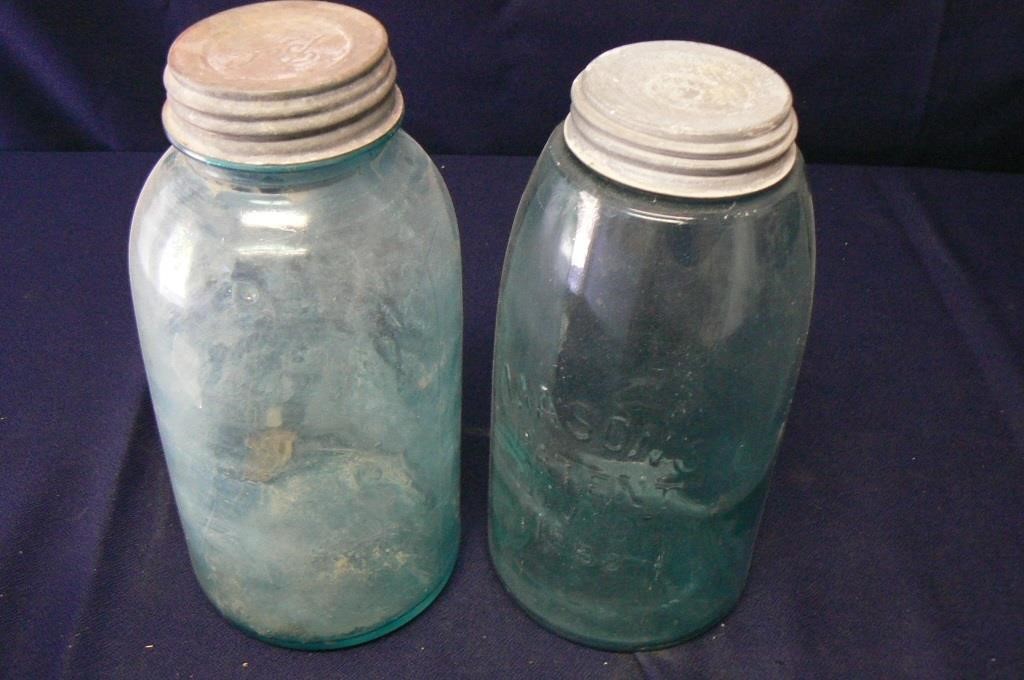 TWO ANTIQUE GREEN BALL MASON JARS