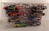 Eight Diecast 1:24 Nascar Cars In Display Case
