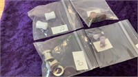 Lot of 4 new ear plugs/gauges in various sizes.