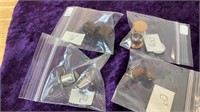 Lot of 4 new ear plugs/gauges in various sizes.