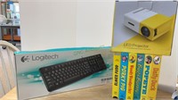 Lot includes LED projector, Logitech keyboard and