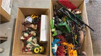 2 box lot of toys. Includes Taz, trucks,