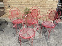 (4)Red metal patio arm chairs.