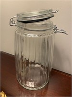 Glass candy jar hinged with lid