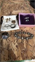 Small group of jewelry. Top ring in box is