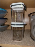 Set of two small heavy plastic food storage contai