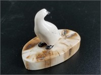Vintage ivory snow goose on ancient ivory