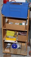 rolling wooden shelf unit and misc. contents