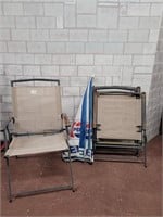Lawn chairs and Pepsi umbrella