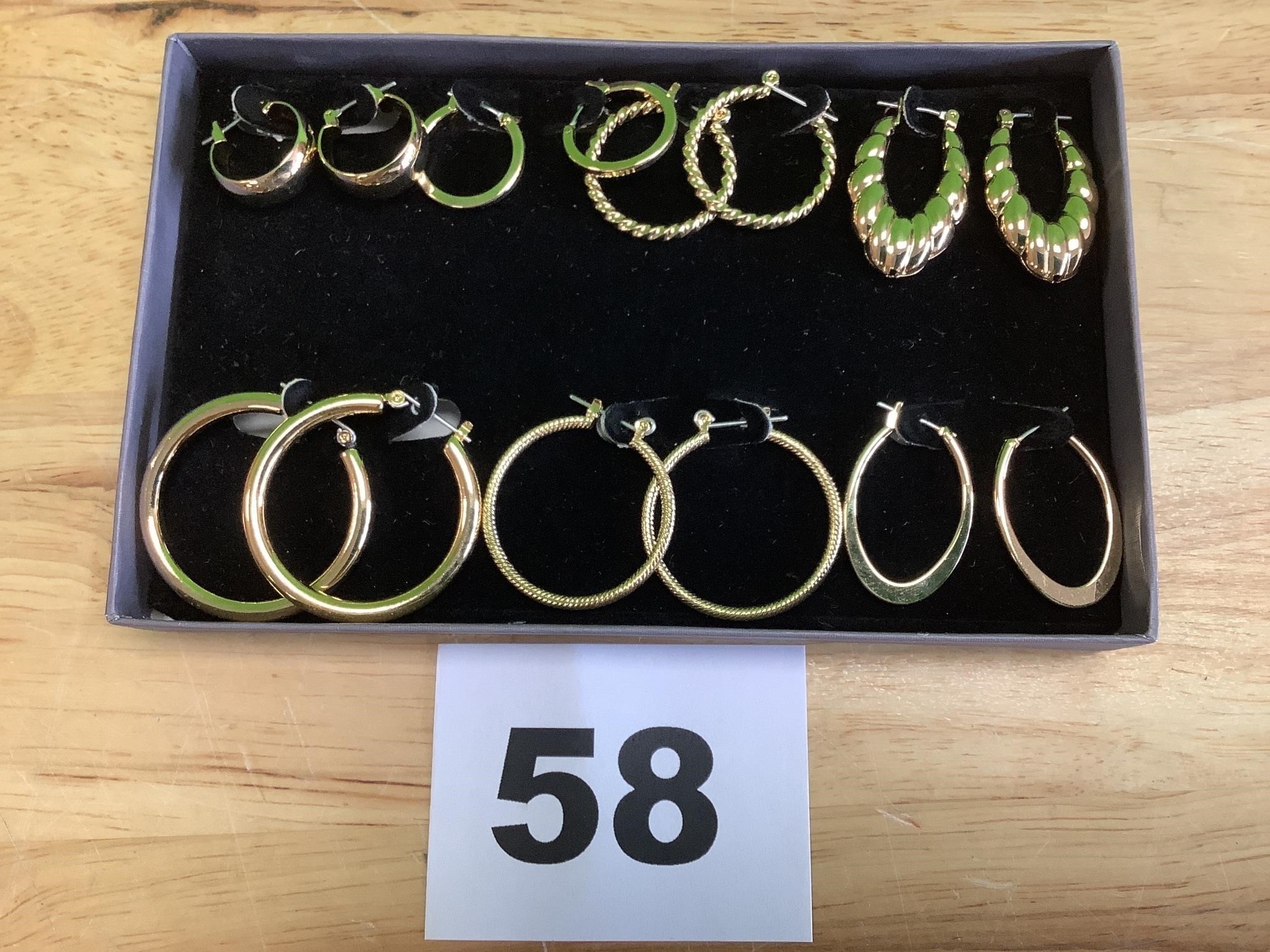 7 Pair of Gold Hoop Earrings