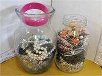 2 JARS WITH BEADS