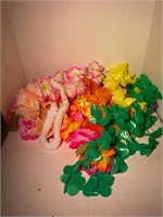 lot of various Hawaiian luau themed leis