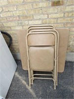 Samsonite folding table and 4 chairs.