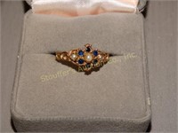 Ladies ring marked 375 RAD w/blue sapphire stones