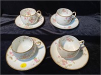 SET OF 4 LIMOGES TEA CUPS AND SAUCERS