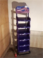 Purple Cadbury plastic display rack on wheels