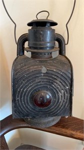 Antique railroad lantern, with the red glass
