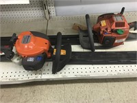 Pair of Husqvarna gas hedge trimmers. The