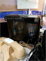 Plastic pitcher dolphins