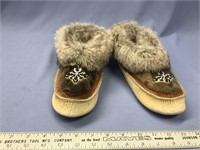 A pair of Native made moccasins - seal skin and ra