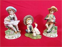 Three Boy and Girl Figurines