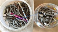 TWO CANISTERS OF HARDWARE - BOLTS, WASHERS, SCREWS