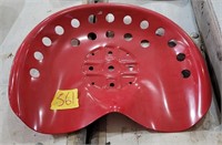 Red tin tractor seat