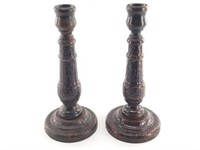 Unique pair of leather covered candlesticks each a