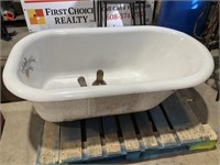 Vintage cast iron bath tub with feet