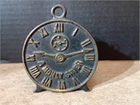 Antique 'A money saver' cast iron clock still